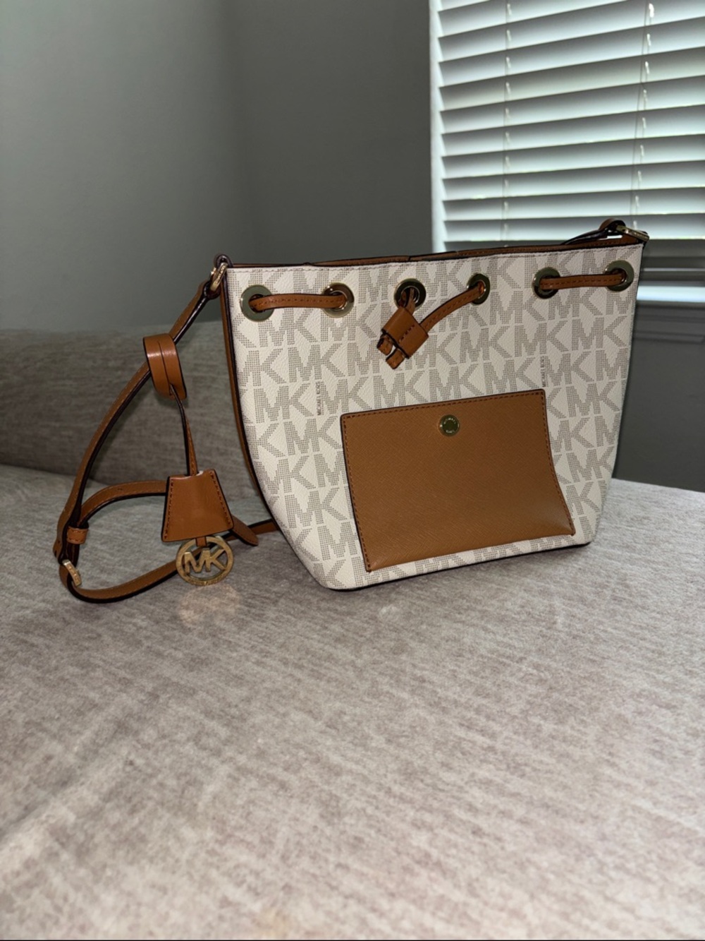 Michael Kors Vanilla and Tan Logo Drawstring Crossbody Bag